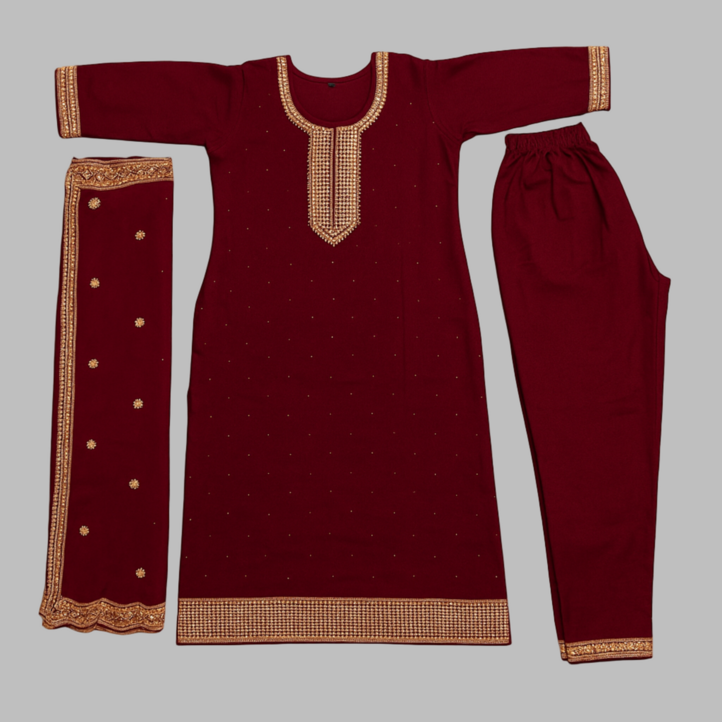 Maroon traditional outfit with gold embroidery on a white background