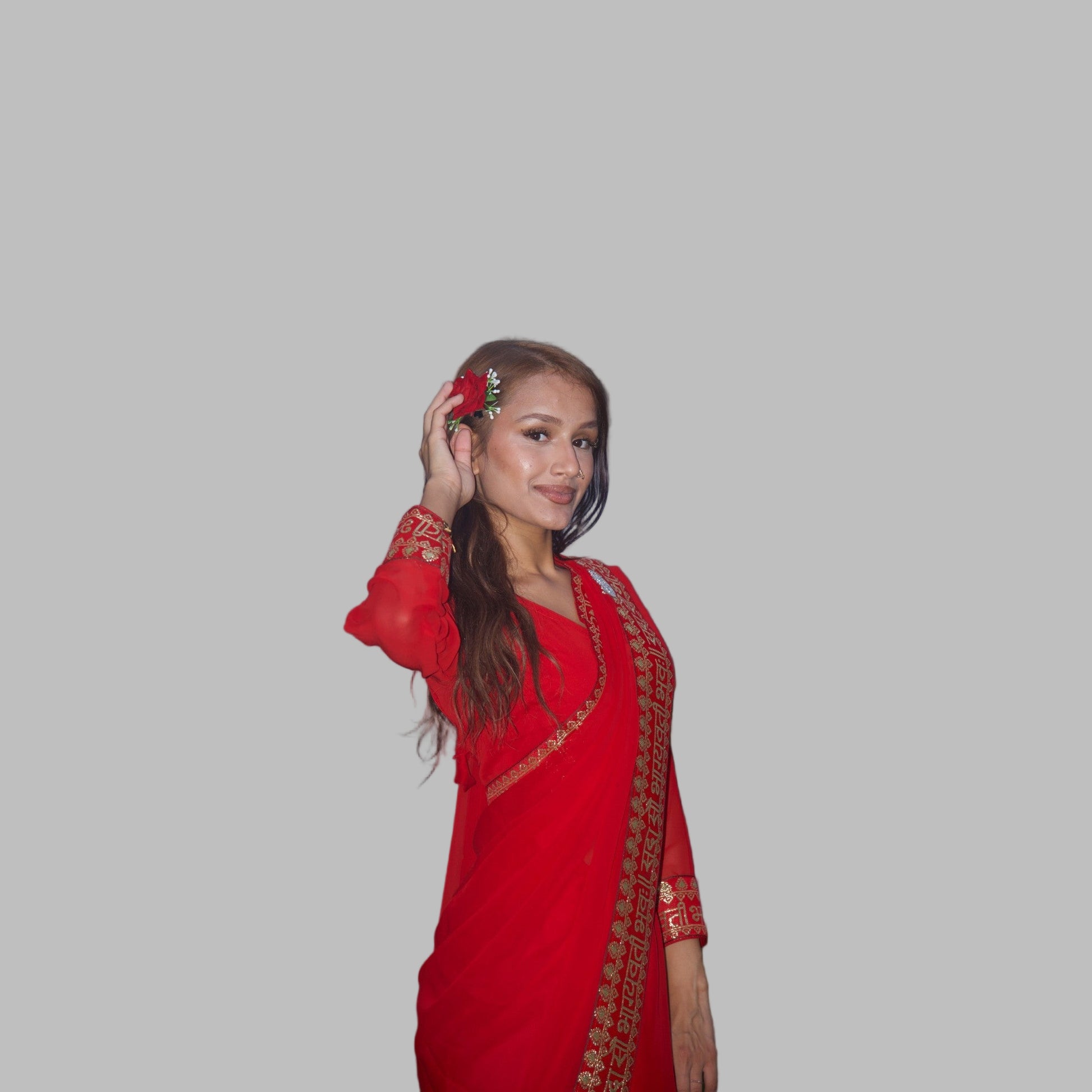 Woman in a red traditional outfit standing with Red Rose Clip