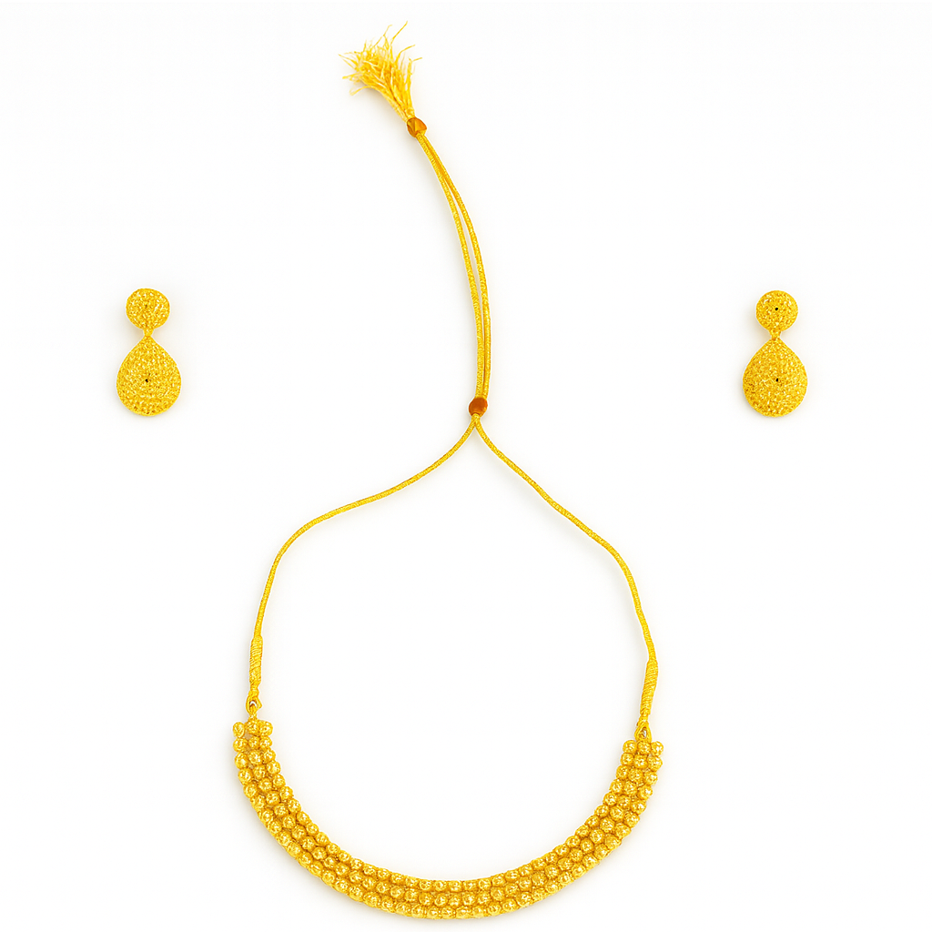 Yellow beaded necklace and earrings set on a white background