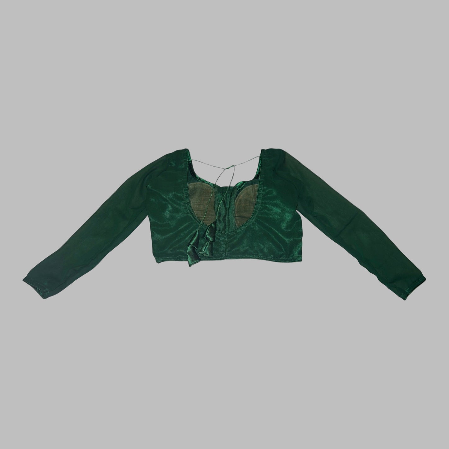 Green crop top on a white background