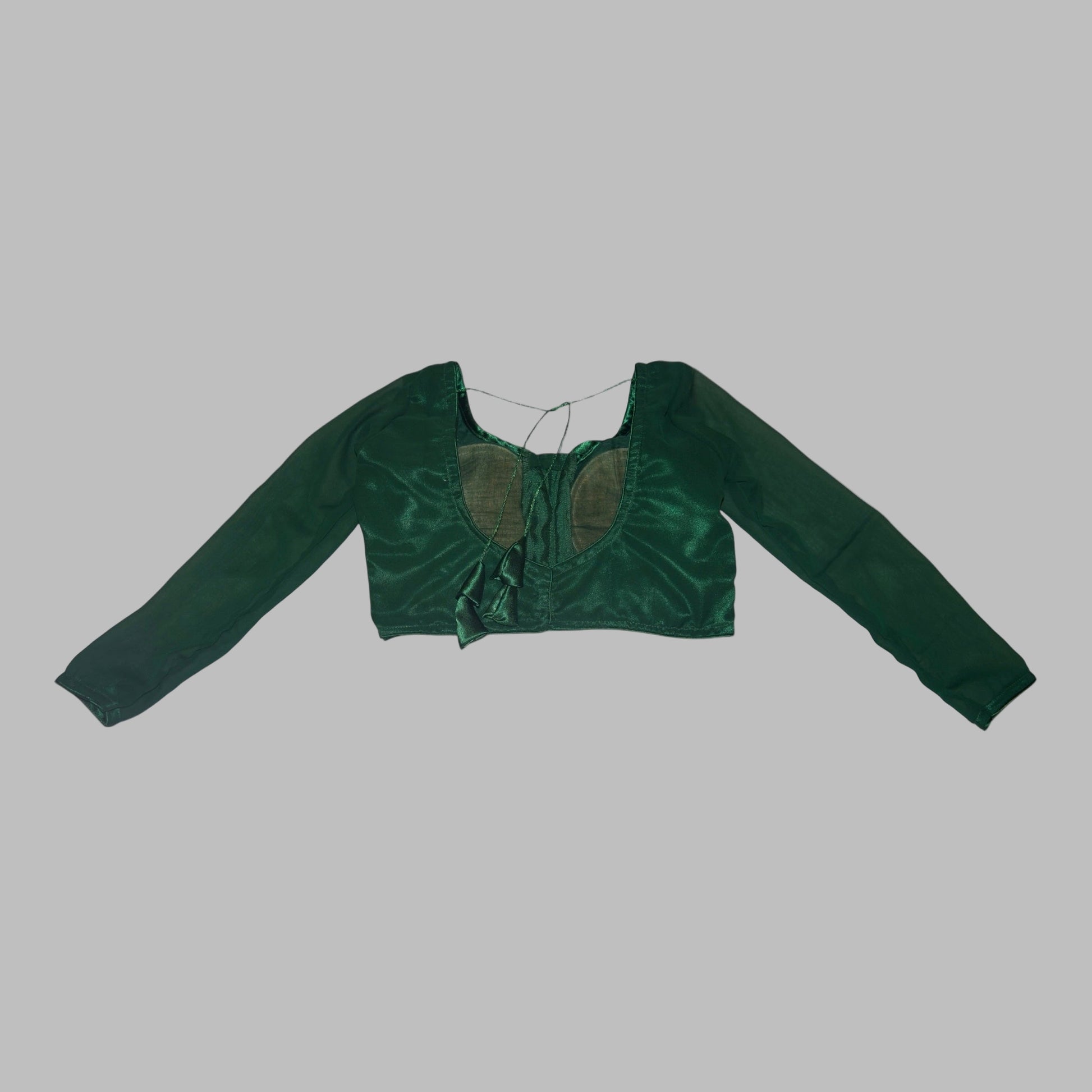 Green crop top on a white background
