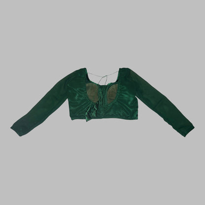 Green crop top on a white background