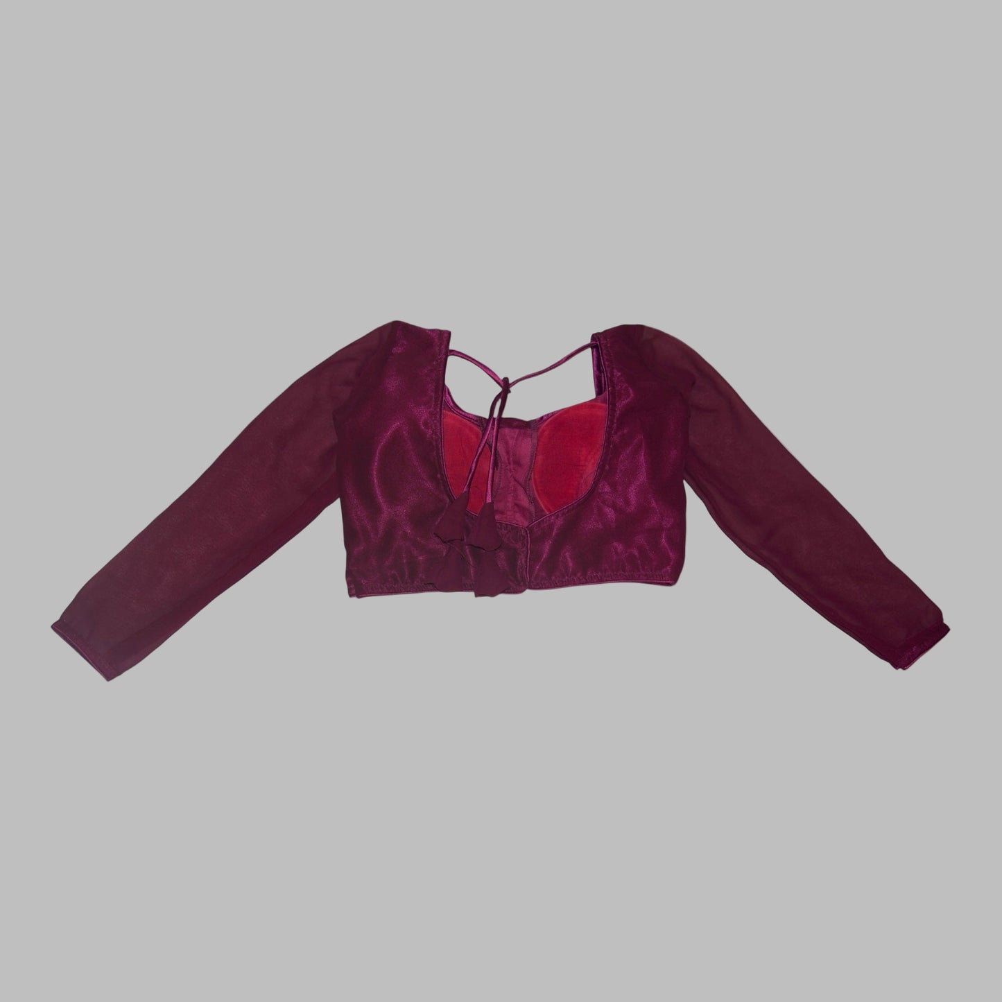 Maroon velvet crop top on a white background