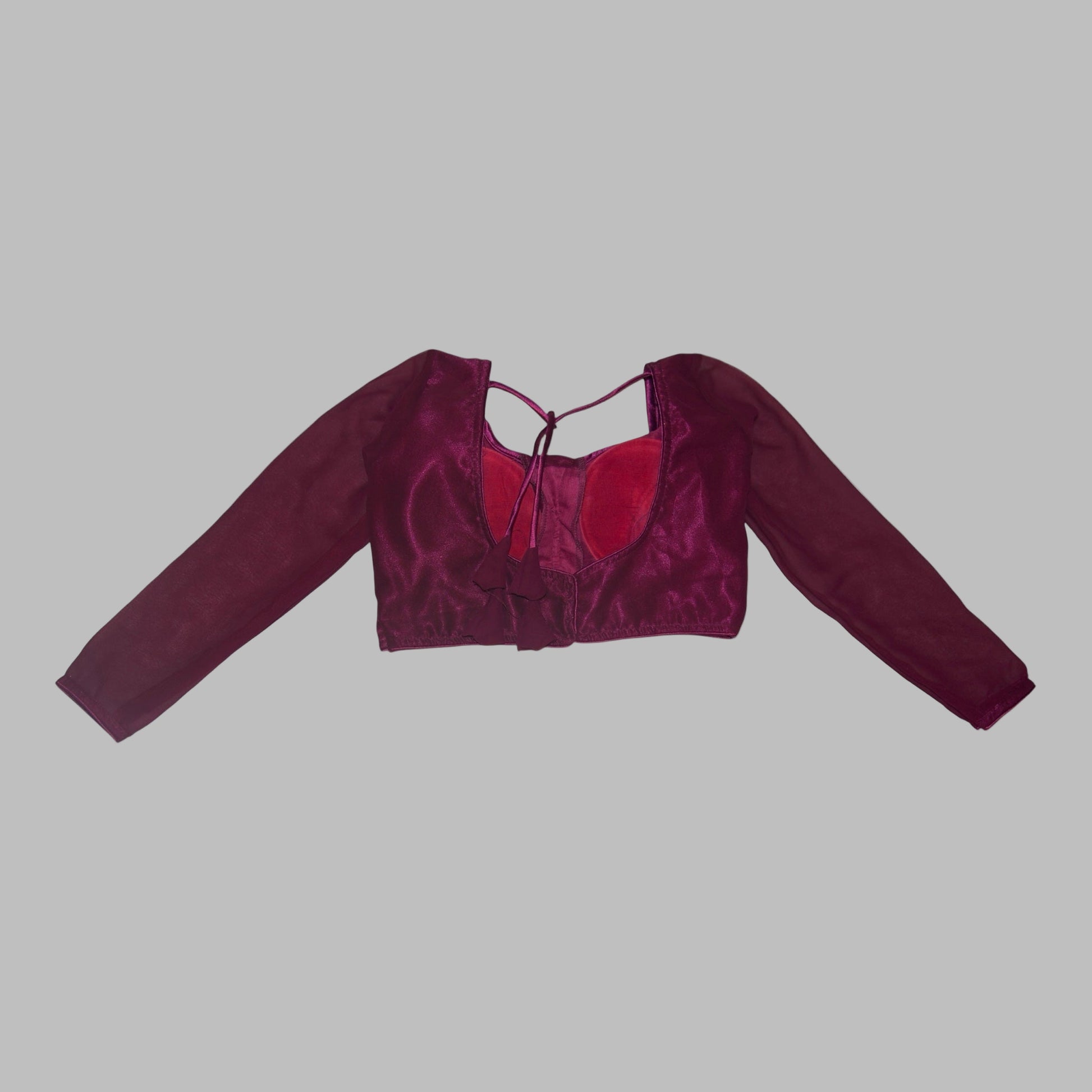 Maroon velvet crop top on a white background