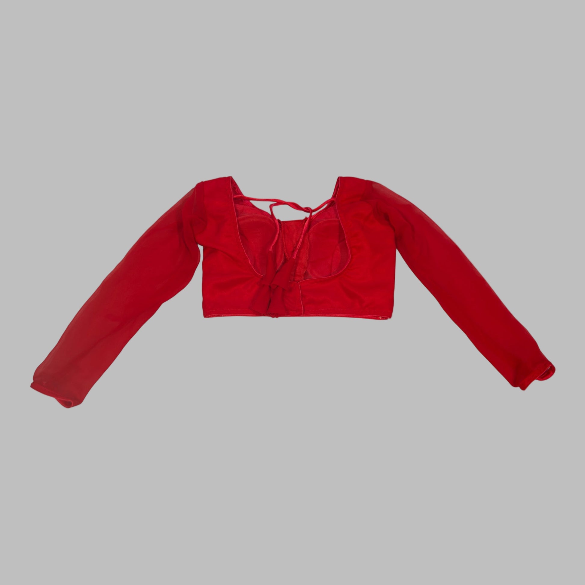 Red velvet crop top with long sleeves on a white background