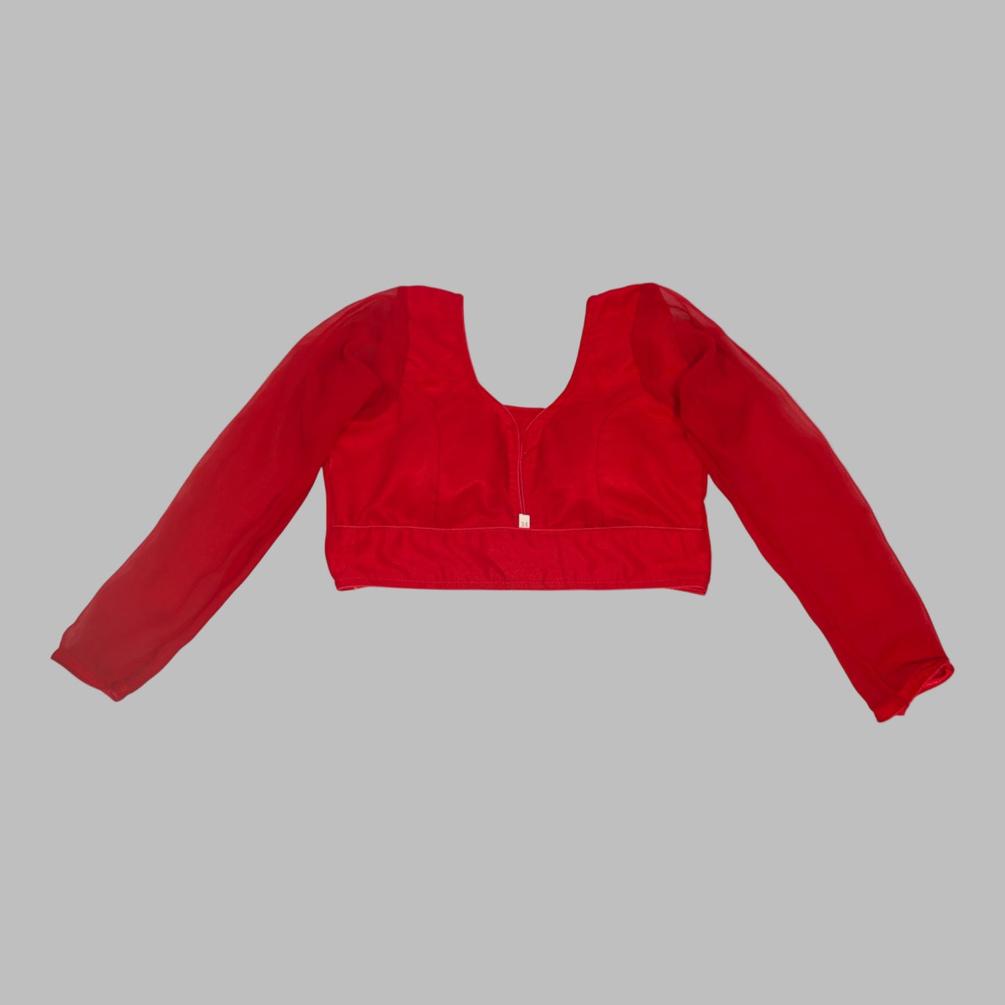 Red crop top with long sleeves on a white background