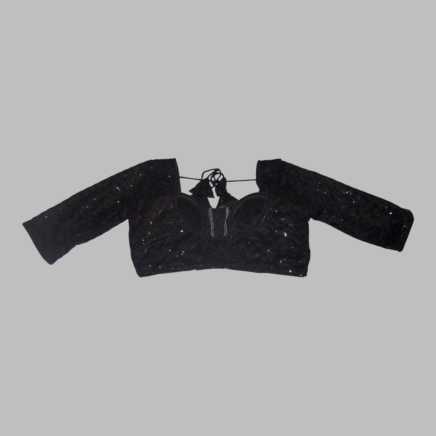 Black textured crop top on a white background