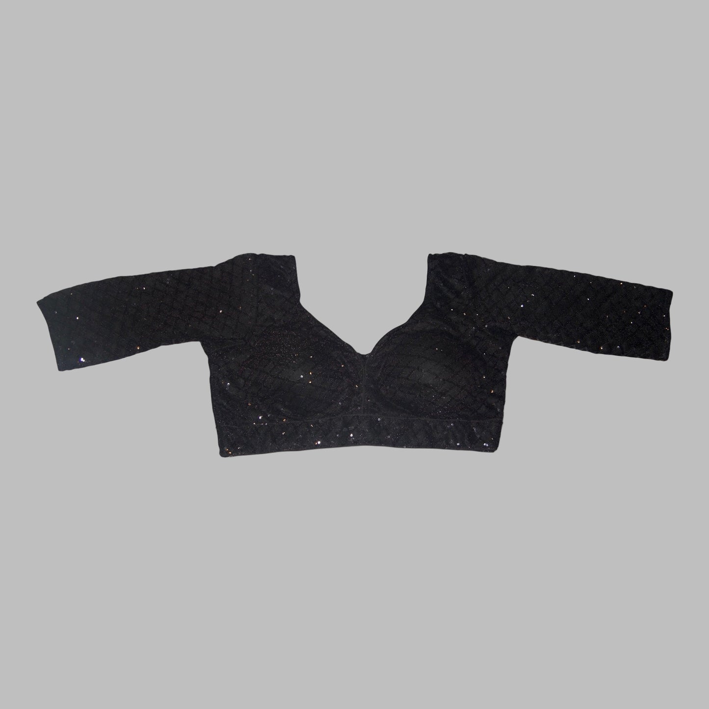 Black blouse with long sleeves on a white background