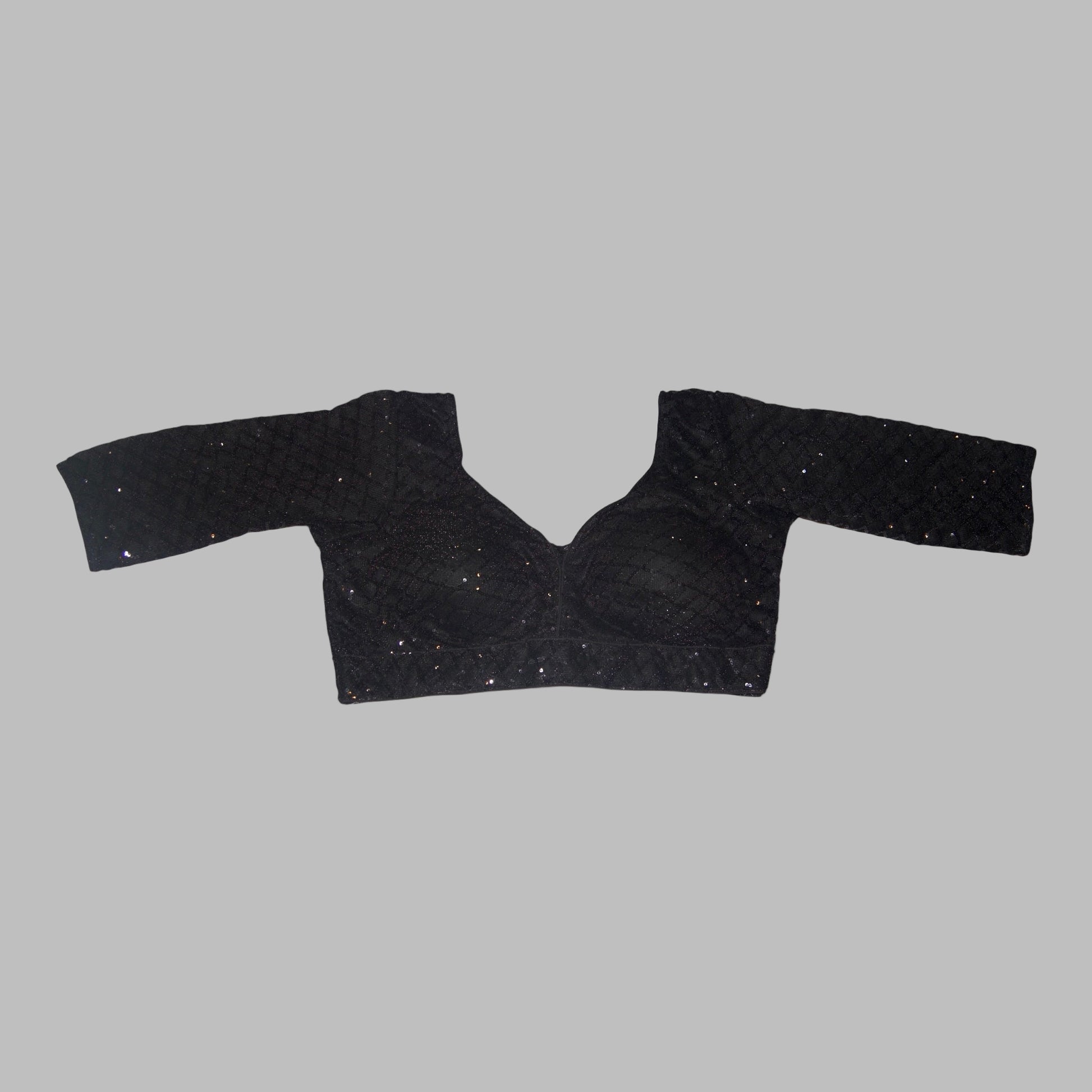 Black blouse with long sleeves on a white background