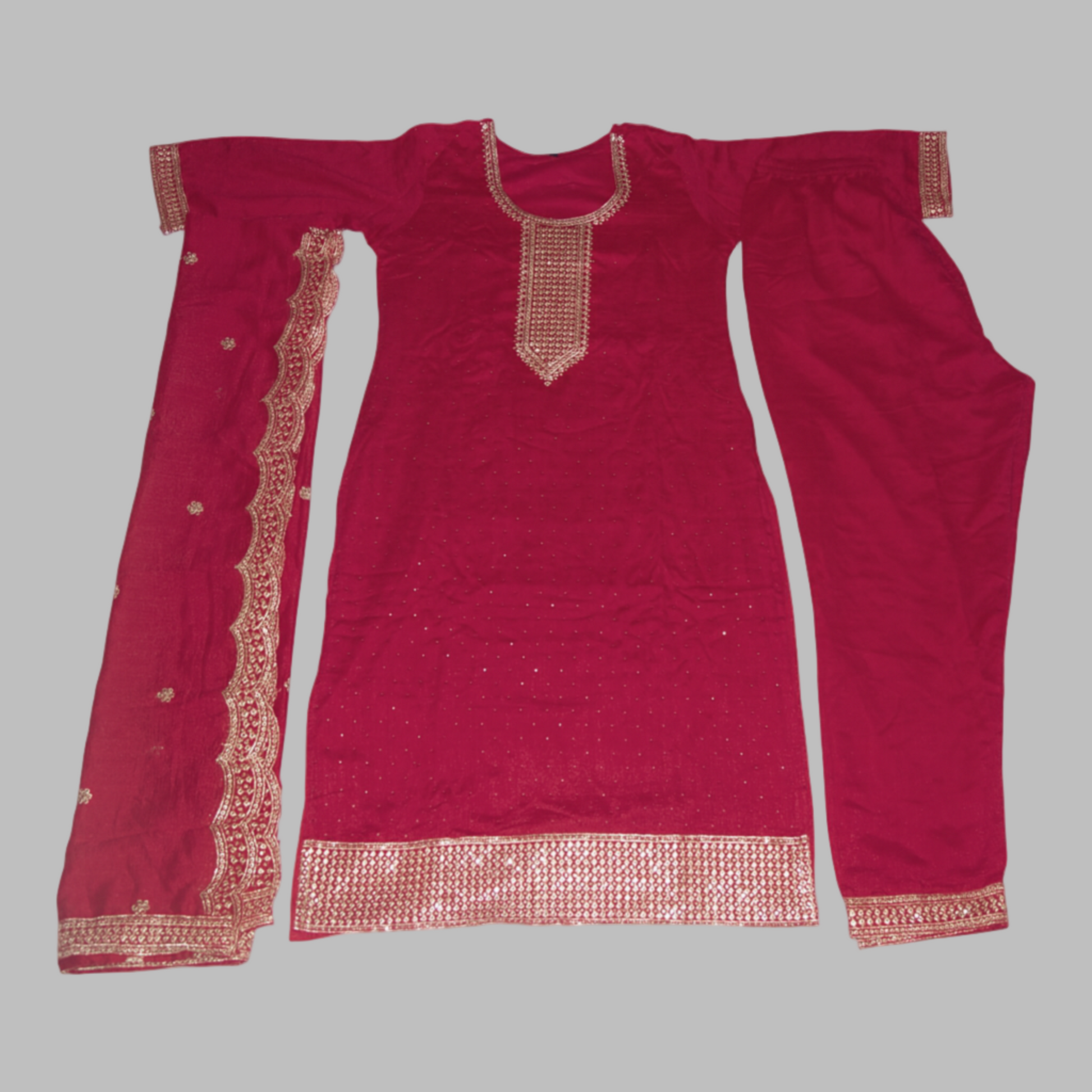 Red traditional outfit with intricate gold embroidery on a white background