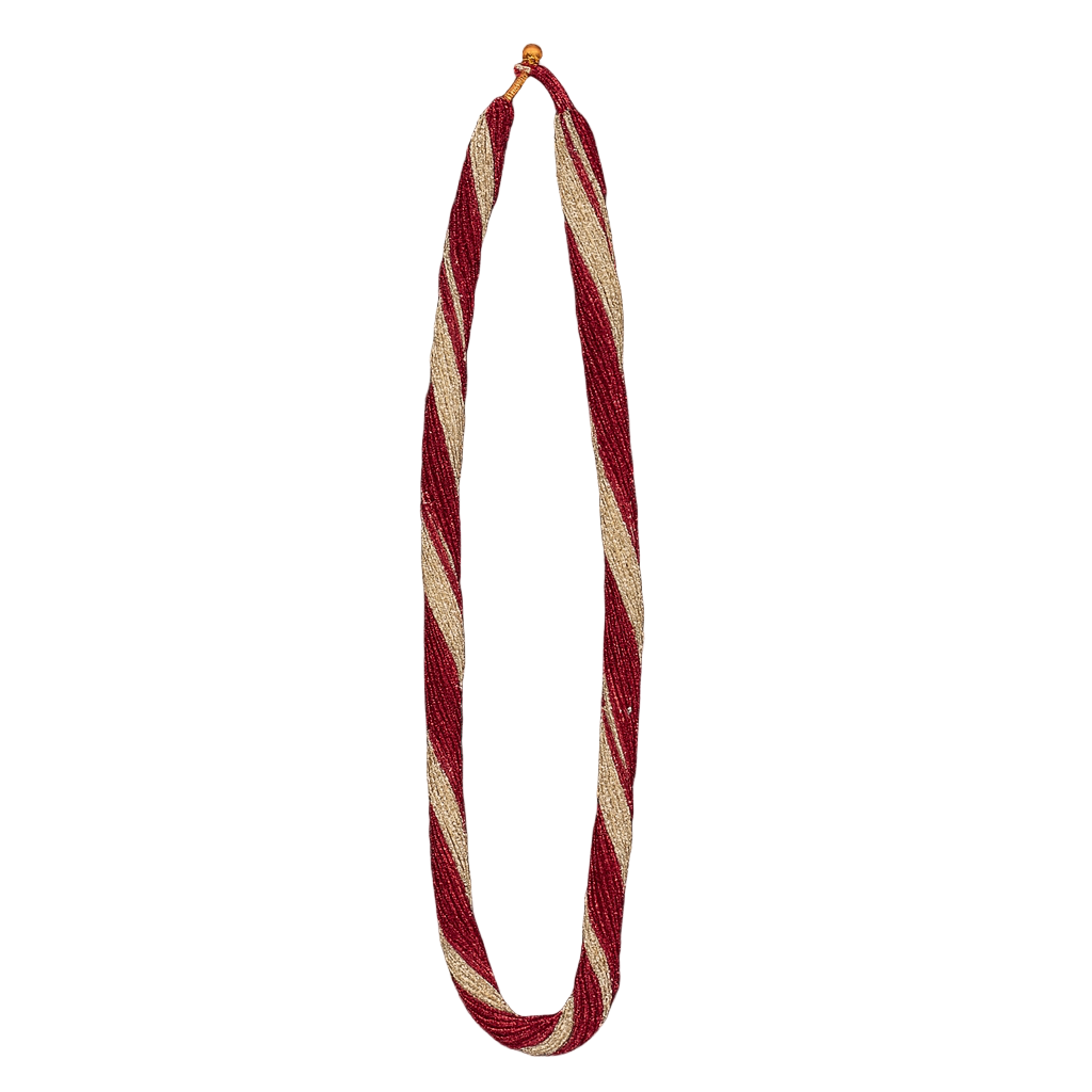 Red and beige striped necklace on a white background